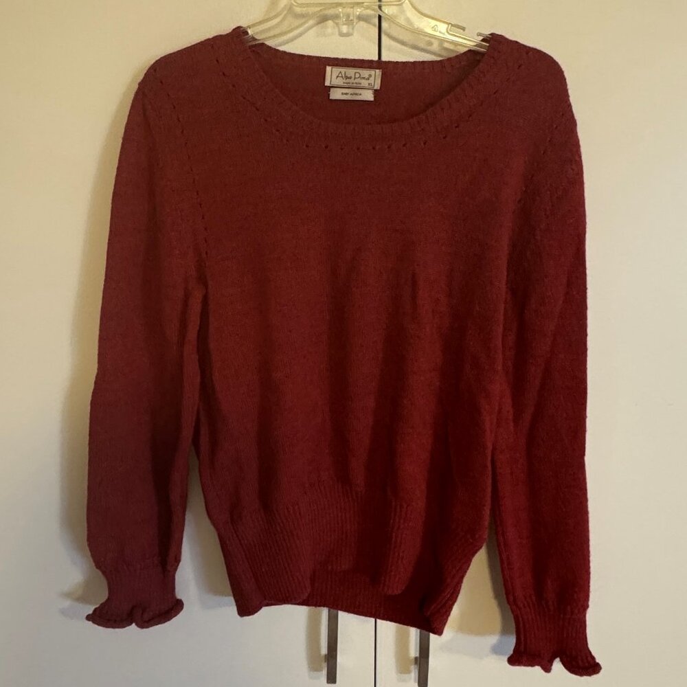 rust colored sweater from Peru